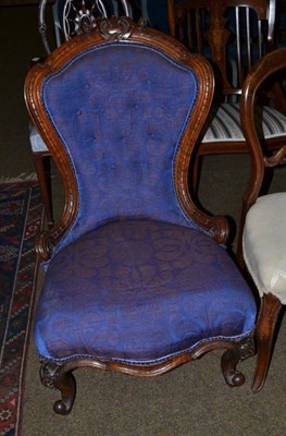 Lot 436 - Nursing chair with carved frame