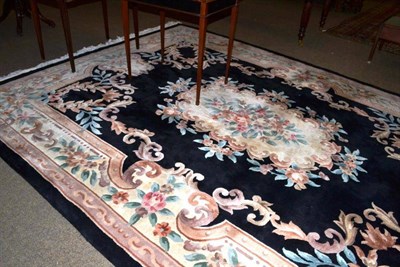 Lot 444 - Chinese carpet of Savonnerie design, the field centred by a floral medallion enclosed by ivory...