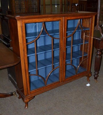 Lot 450 - A mahogany display cabinet with astral glazed door