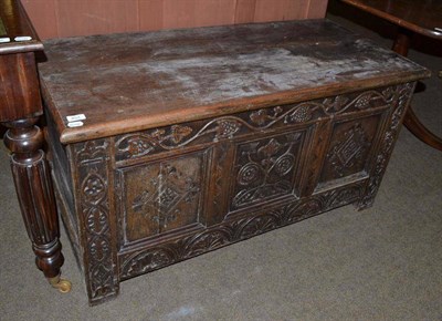 Lot 453 - A 17th century and later carved oak coffer