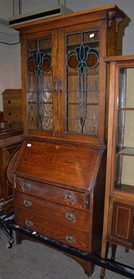 Lot 456 - An Arts & Crafts bureau bookcase