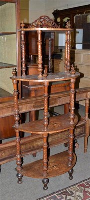 Lot 458 - A Victorian four tier whatnot