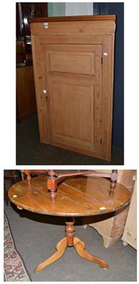 Lot 466 - A large Victorian pine wall hanging corner cupboard and a similar circular kitchen table