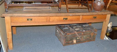 Lot 545 - A Victorian pine kitchen table with three drawers and raised upon square tapering legs