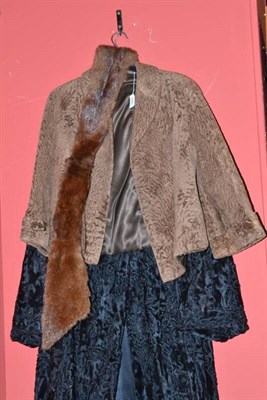 Lot 548 - Black Persian lamb coat, brown jacket and a fur collar (3)