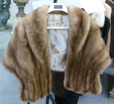 Lot 561 - A black Persian lamb coat, two fur stoles and two collars (5)