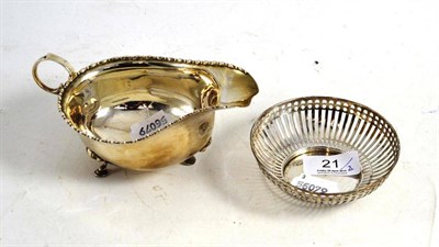 Lot 21 - Silver sauce boat and a small silver pierced dish (2)