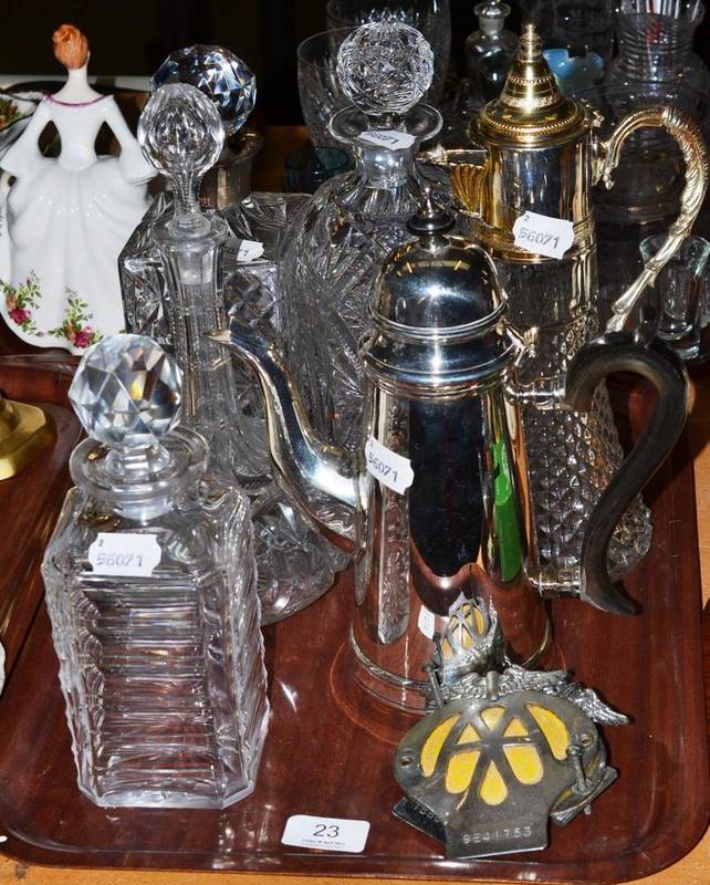 Lot 23 - A cut glass claret jug with plated mounts, a silver mounted decanter, plated coffee pot,...