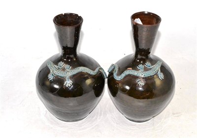 Lot 31 - A pair of lizard decorated bottle vases (a.f.), signed Brannam, dated 1880