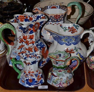 Lot 39 - A tray including three Mason's ironstone graduated jugs, two other Mason's jugs and a large...