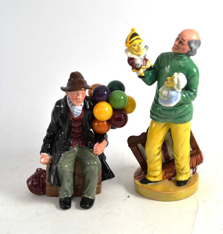 Lot 59 - Two Royal Doulton figures 'Punch and Judy Man' HN2766 and 'The Balloon Man' HN1954
