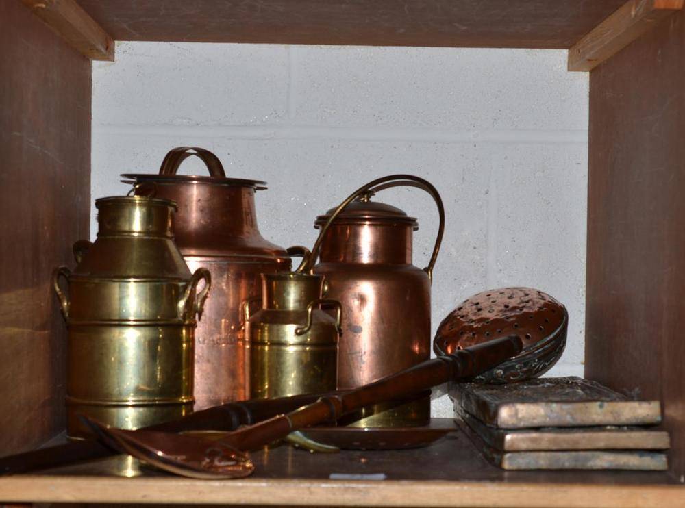 Lot 71 - Two brass milk cans with lids, two brass and copper milk cans with lids, a copper ladle with wooden