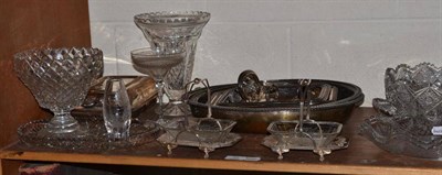 Lot 72 - A shelf of cut glass vases and bowls, plated entree dishes and covers and a pair of glass...