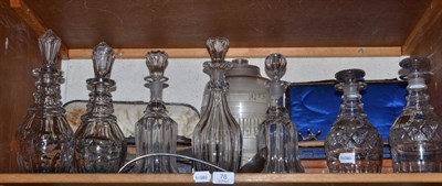 Lot 78 - A pair of Georgian mallet decanters with mushroom stoppers and plated decanter labels; two...