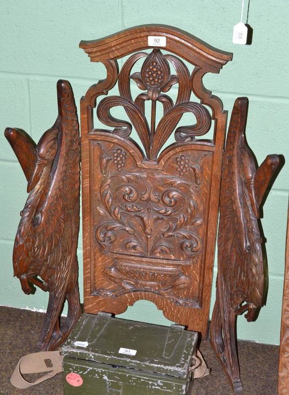 Lot 92 - An Arts and Crafts carved oak screen