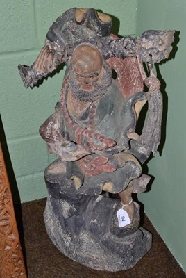 Lot 94 - A Chinese polychrome figure, in Ming style, 62cm high