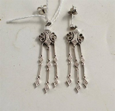 Lot 112 - A pair of diamond set chandelier earrings