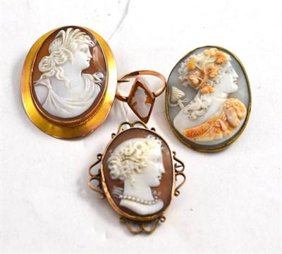 Lot 124 - Three cameo brooches and a cameo ring