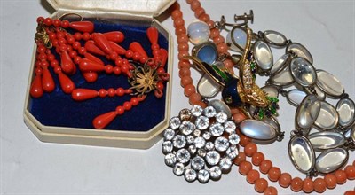 Lot 138 - Coral beads, a moonstone necklace, a paste brooch, assorted earrings etc