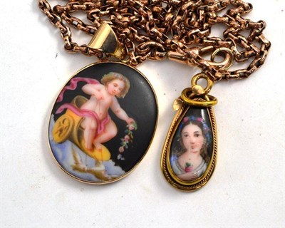 Lot 139 - A guard chain hung with a pendant and a drop, both transfer painted