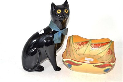 Lot 185 - A Clarice Cliff Bizarre pottery bowl (a.f.) and a Bretby black glazed figure of a cat with...
