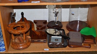 Lot 242 - A collection of treen including book slide, small press, crumb scoops, pipe rack, barometer,...