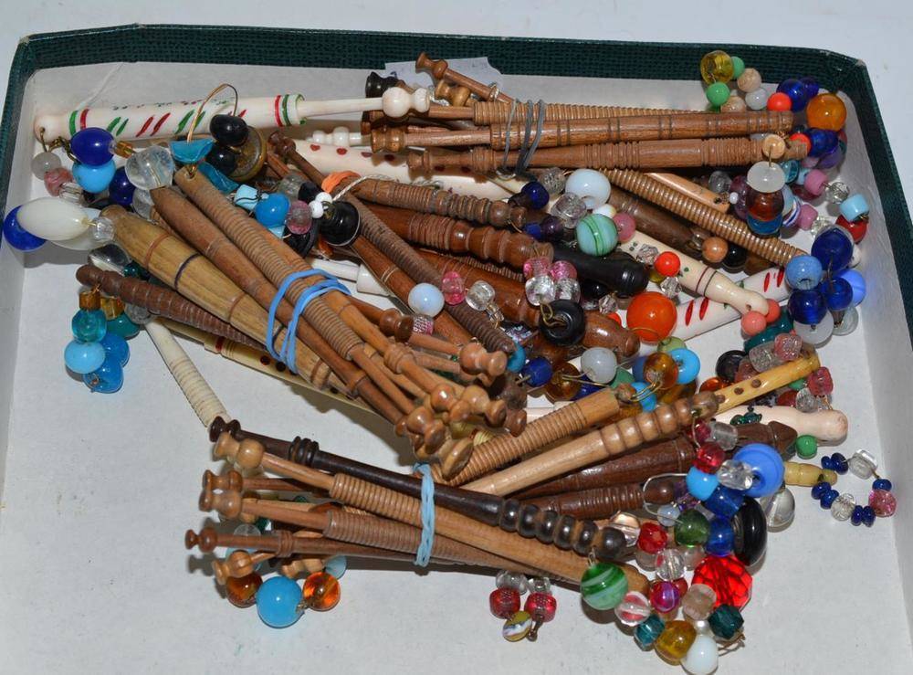 Lot 246 - Assorted treen and bone lace bobbins, some named with coloured glass spangles