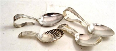 Lot 249 - Georgian silver caddy spoon with bright cut decoration, Irish caddy spoon, salt spoon and two...