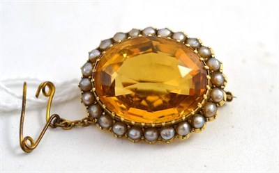 Lot 265 - A citrine and pearl brooch