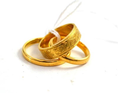 Lot 281 - Three 22ct gold band rings