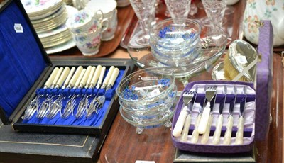 Lot 303 - Cased plated flatware, glass sundae set, silver backed dressing table set and a fur coat