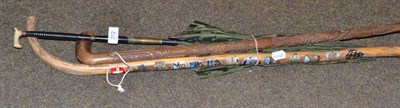 Lot 312 - Late Victorian parasol and two walking sticks