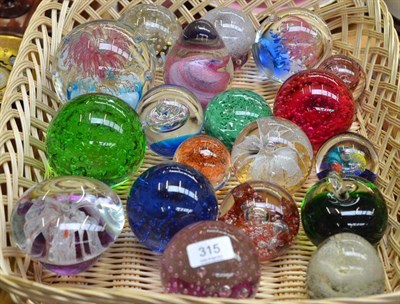 Lot 315 - A basket of nineteen various large glass paperweights