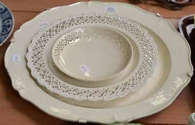 Lot 322 - Two creamware dishes with pierced borders and a large creamware platter