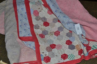 Lot 329 - Late 19th century floral sprigged striped and patchwork quilt