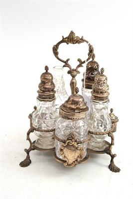 Lot 340 - An early George III silver five bottle cruet with cut glass bottles, stand with hallmarks for...