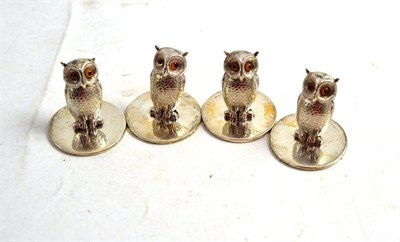 Lot 370 - Set of four silver owl menu holders
