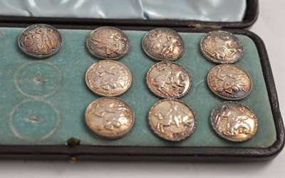 Lot 378 - Ten silver buttons, cased
