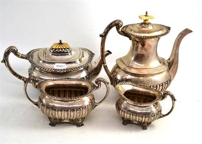 Lot 410 - Four piece silver tea and coffee service, Sheffield, 1911, by Walker and Hall, in a fitted oak case