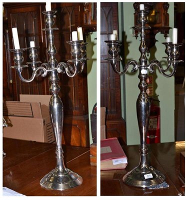 Lot 420 - Pair of plated five light candelabra