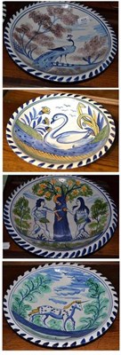 Lot 424 - A set of four Staffordshire polychrome plaques, of recent date