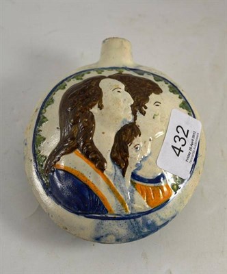 Lot 432 - A Pratt ware flask, moulded with a portrait of Naval officer and a family portrait