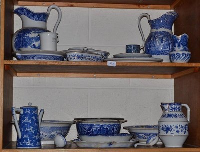 Lot 452 - Two shelves of blue and white pottery