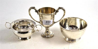 Lot 459 - Two silver handled cups and a bowl