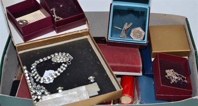 Lot 463 - A box of assorted silver and costume jewellery including Past Times and other brooches,...