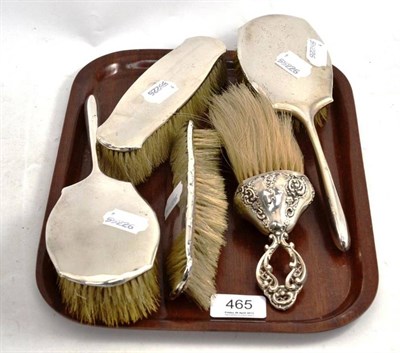 Lot 465 - Five silver backed brushes