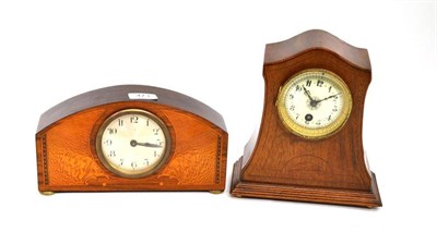 Lot 473 - An Edwardian mahogany mantel clock and an Edwardian mahogany burr wood veneered mantel clock