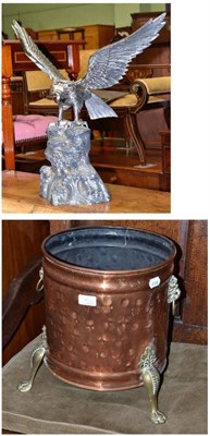 Lot 492 - Copper and brass mounted coal bin and plated bird of prey on rocky base (2)