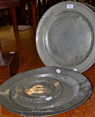 Lot 496 - Three 18th century pewter chargers and two plates