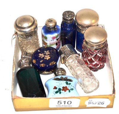 Lot 510 - Nine silver topped scent bottles including two blue, one green, one ruby flashed, etc